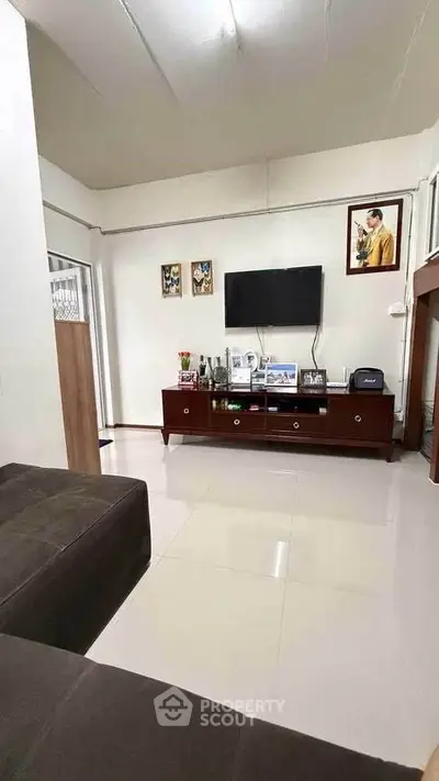 Cozy living room with modern TV setup and elegant decor