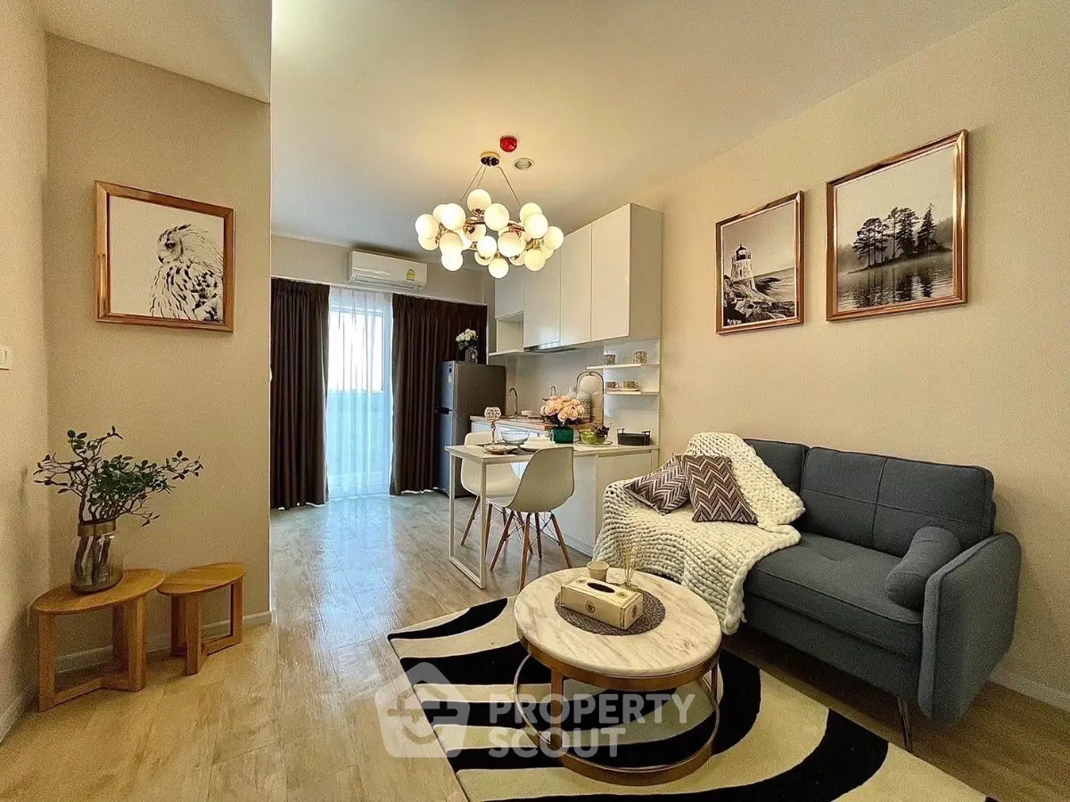 Stylish living room with modern decor, cozy sofa, and elegant lighting in a chic apartment.