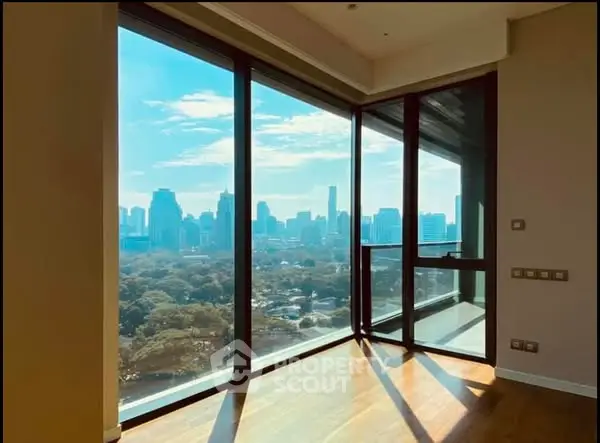 Stunning corner unit with floor-to-ceiling windows offering breathtaking city views.
