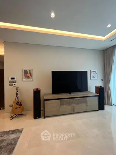 Modern living room with sleek TV setup and elegant decor