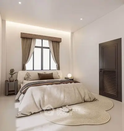 Luxurious bedroom with elegant decor and cozy ambiance, featuring a plush bed and stylish furnishings.