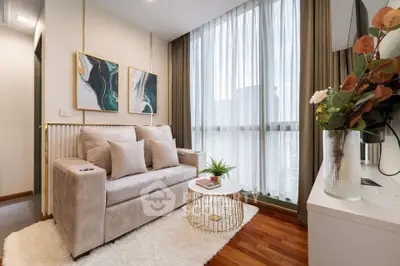 Stylish living room with modern decor and large window view