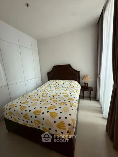 Cozy bedroom with stylish decor and modern furnishings