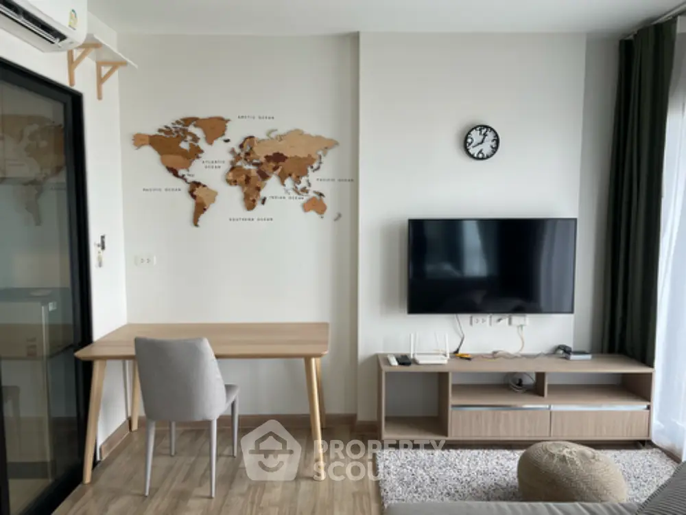 Modern living room with wall-mounted TV and world map decor