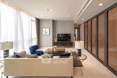 Luxurious modern living room with elegant decor and natural light