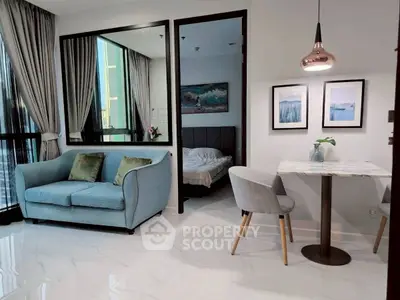 Modern living room with elegant decor and cozy seating area