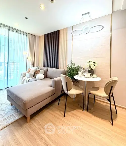 Modern living room with stylish decor and cozy seating area, perfect for relaxation.