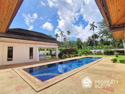 Luxurious villa with private pool and lush garden in tropical paradise