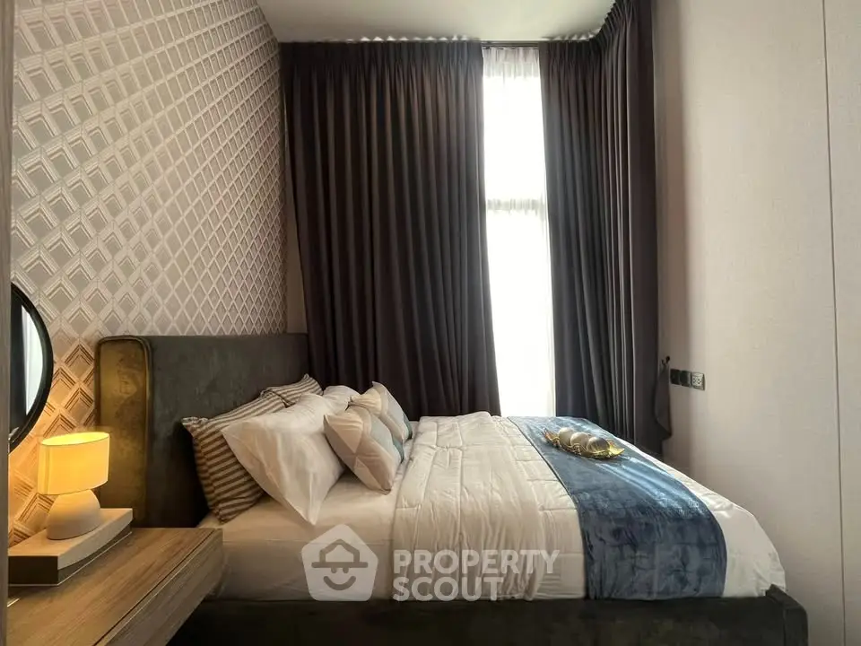 Luxurious bedroom with elegant decor and natural light