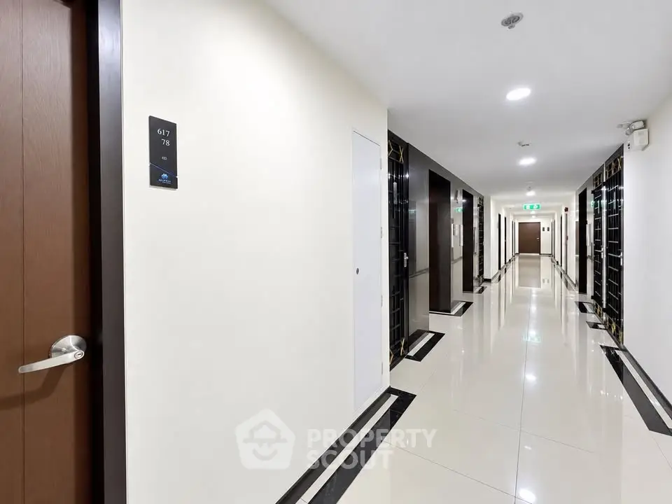Modern apartment corridor with sleek design and polished flooring