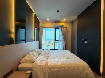 Luxurious bedroom with stunning city view and modern decor