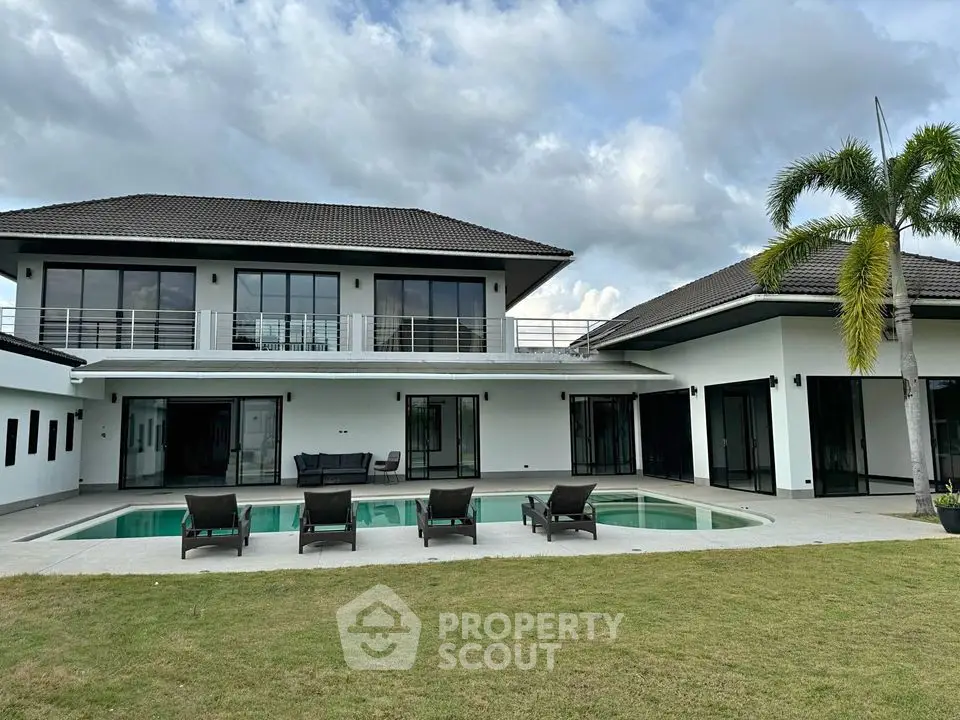 Luxurious modern villa with private pool and spacious garden area, perfect for relaxation and entertainment.