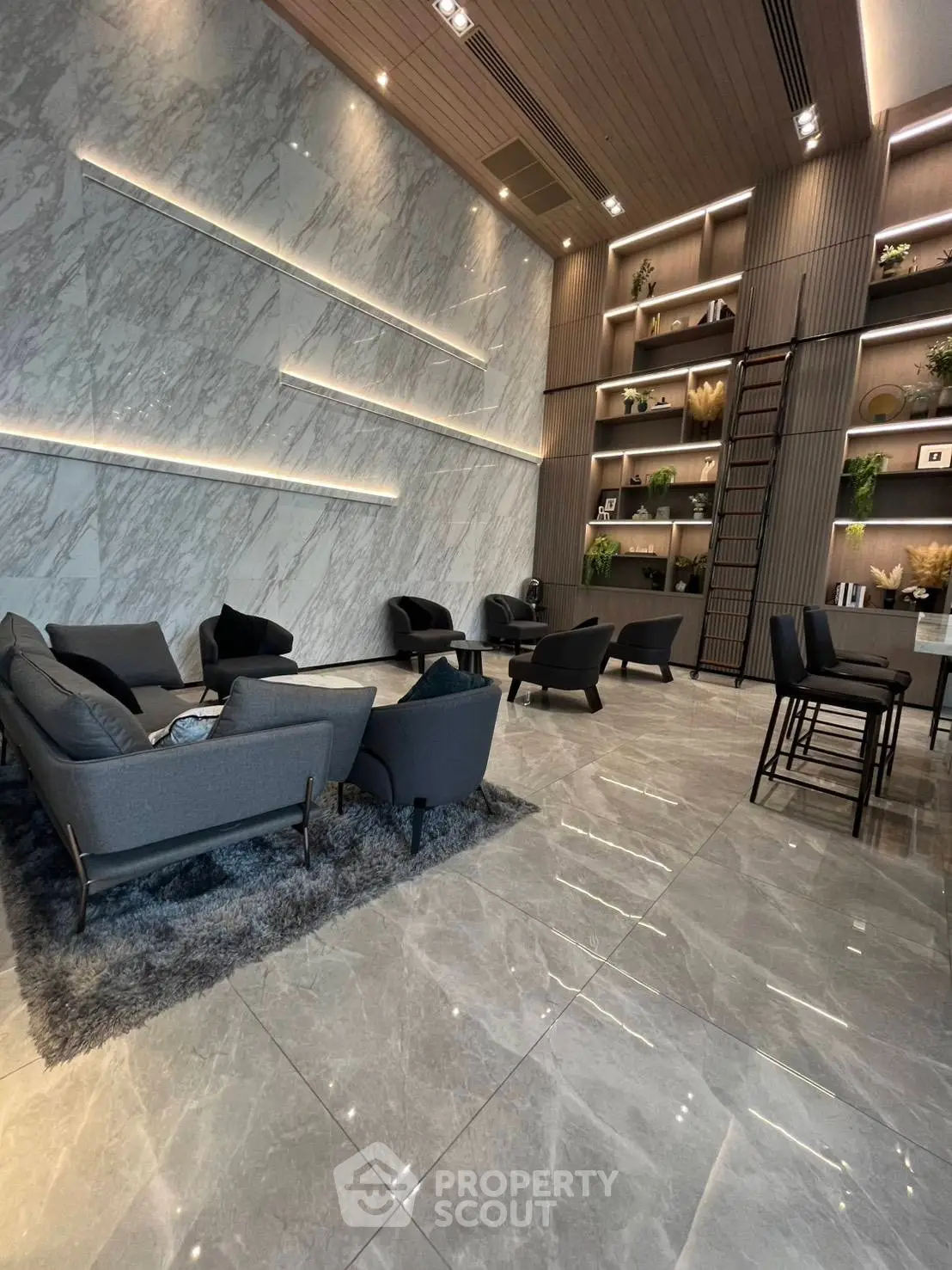 Luxurious modern living room with sleek marble walls and elegant furniture