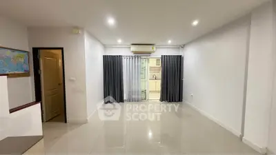 Spacious living room with modern design and natural light