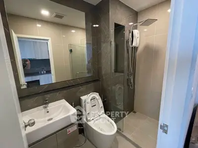 Modern bathroom with sleek design and glass shower enclosure