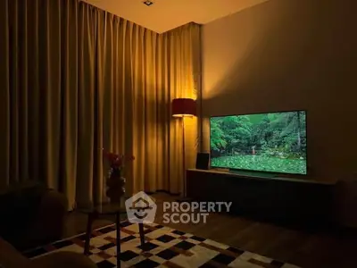 Cozy living room with ambient lighting and modern TV setup