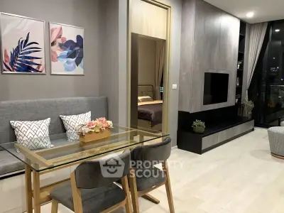 Modern open-plan living room with stylish decor and dining area