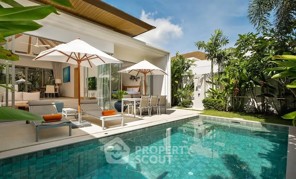 Luxurious villa with private pool and lush garden, perfect for tropical living.