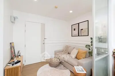 Chic modern living room with cozy sofa and stylish decor in bright apartment.