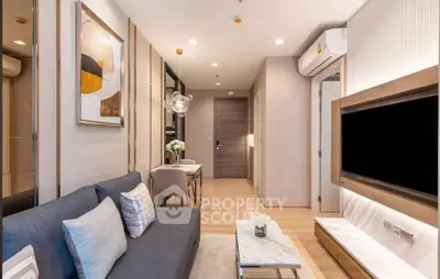 Modern living room with stylish decor, cozy seating, and sleek entertainment setup in a contemporary apartment.