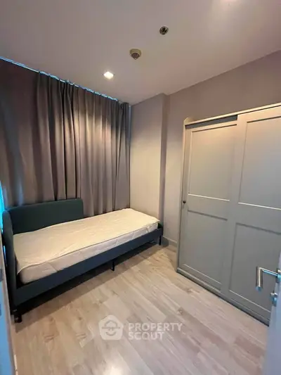 Cozy bedroom with modern design and ample storage space