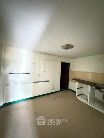 Spacious kitchen with open layout and ample natural light.