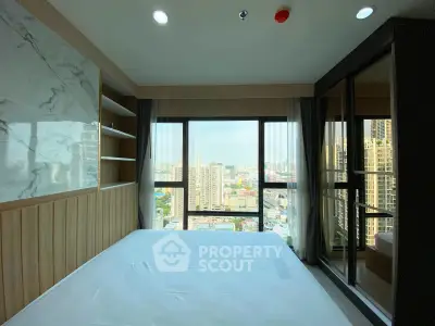 Modern bedroom with panoramic city view and elegant interior design