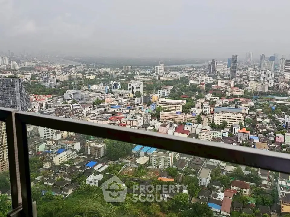 Stunning cityscape view from a high-rise balcony, showcasing urban living at its finest.