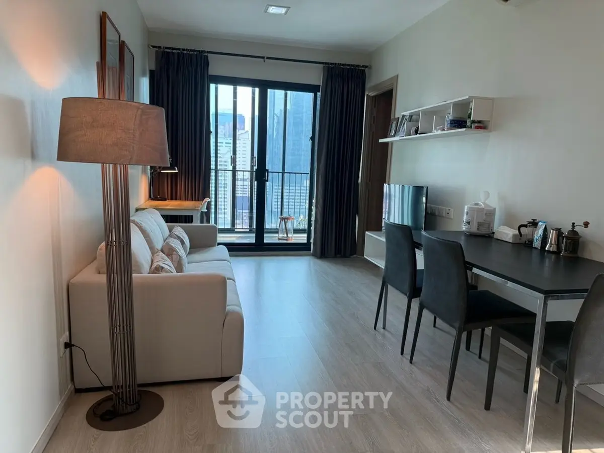 Modern living room with city view and stylish furniture