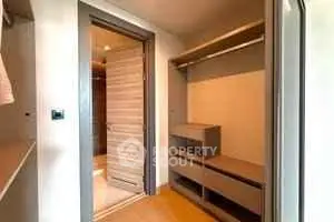 Spacious walk-in closet with modern shelving and ample storage space.