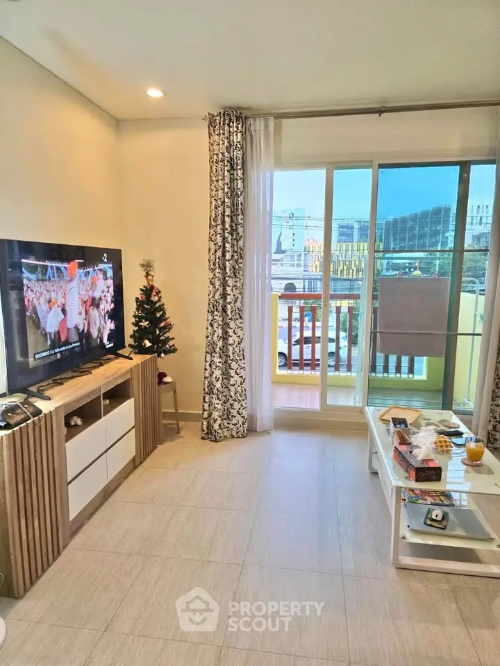 Modern living room with balcony view and stylish decor