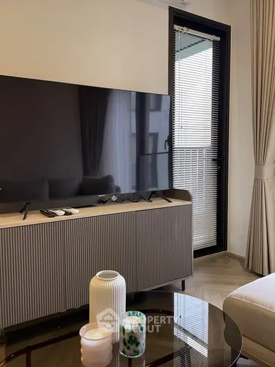 Modern living room with sleek TV setup and elegant decor
