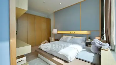 Luxurious modern bedroom with elegant design and ample natural light