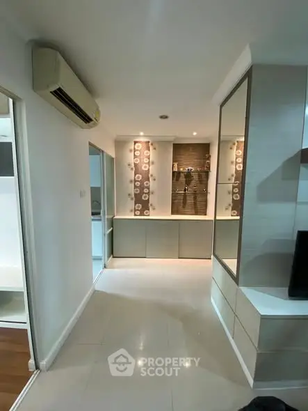 Modern interior with sleek design and built-in storage solutions.