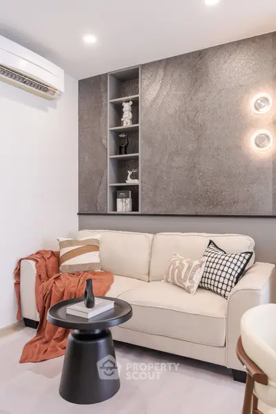 Modern living room with stylish decor and cozy seating area