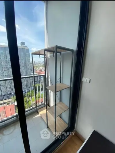 Modern balcony with city view and sleek shelving unit