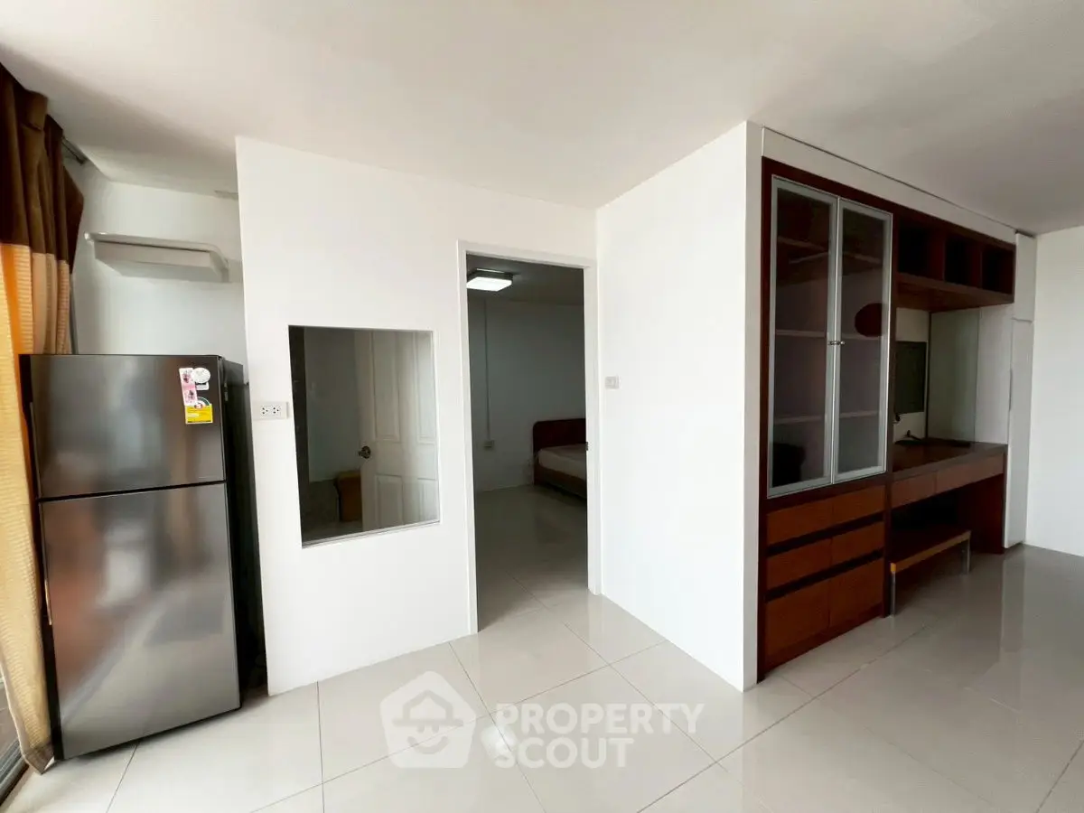 Modern apartment interior with sleek kitchen and spacious layout