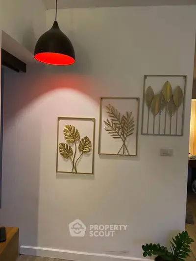 Stylish interior with modern wall art and ambient lighting