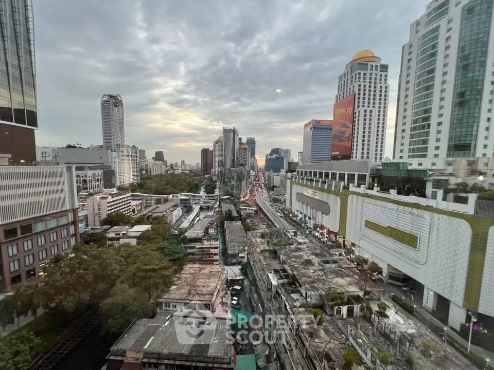 Stunning cityscape view from a high-rise building, showcasing urban architecture and vibrant skyline.