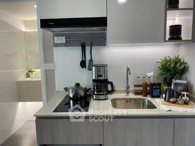 Modern kitchen with sleek appliances and stylish decor