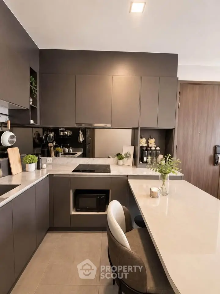 Modern kitchen with sleek cabinetry and integrated appliances