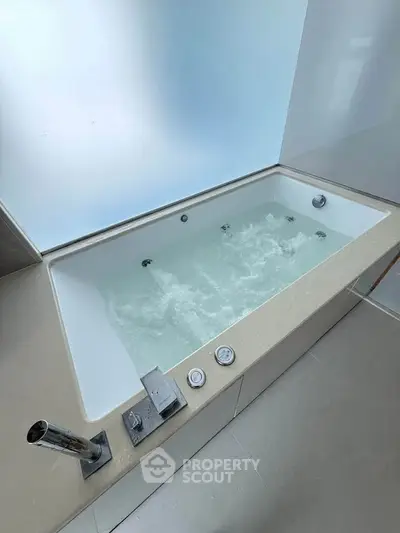 Luxurious bathroom with modern bathtub featuring sleek design and premium fixtures.