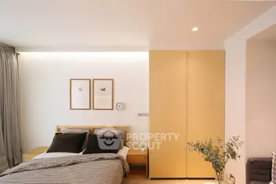 Modern bedroom with cozy bed and minimalist decor