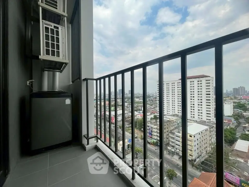 Stunning city view from high-rise balcony with modern air conditioning unit.