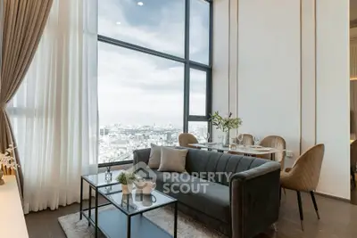 Luxurious high-rise living room with stunning city view and elegant decor