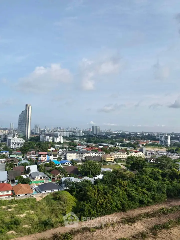 Stunning cityscape view with lush greenery and modern buildings, perfect for urban living.