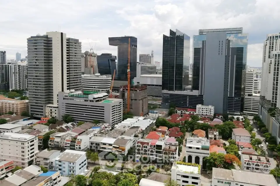 Stunning cityscape view showcasing modern skyscrapers and residential buildings in a vibrant urban setting.