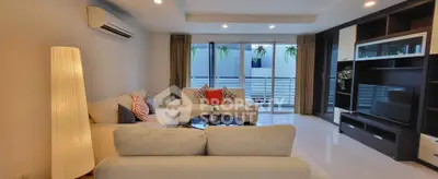 Spacious modern living room with cozy sofas and stylish decor