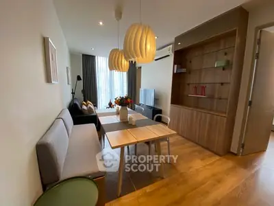 Modern living room with stylish lighting and cozy seating area