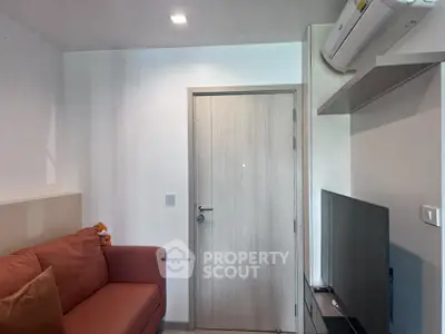 Modern living room with sleek design and air conditioning